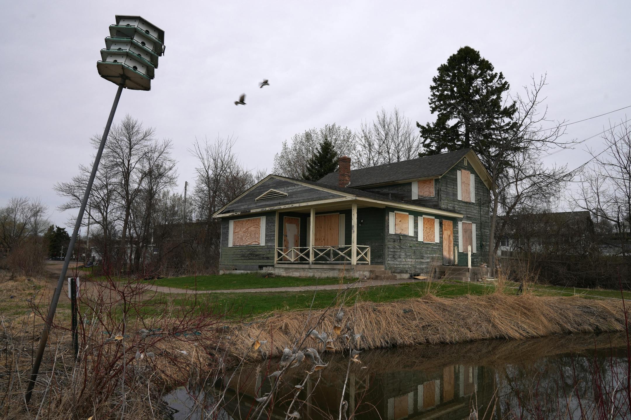 The 1902 Section Foreman House, a possible candidate for the National Register of Historic Places where the railroad foreman used to live, sat rundown and boarded up near the BNSF Railway tracks Thursday in Wayzata.