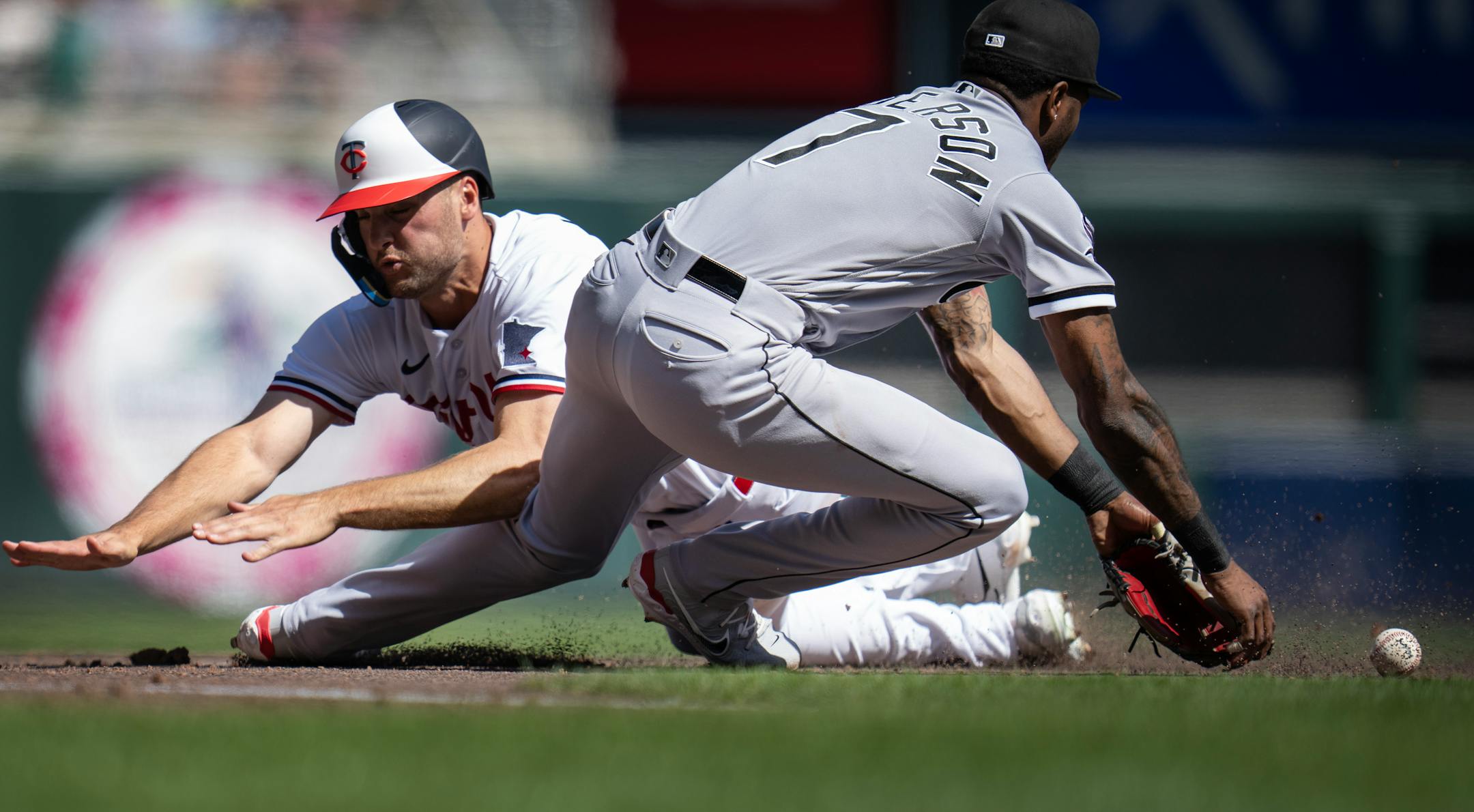Twins right fielder Matt Wallner was safe a third after he collided with Chicago White Sox shortstop Tim Anderson (7) during a rundown in the fourth inning.