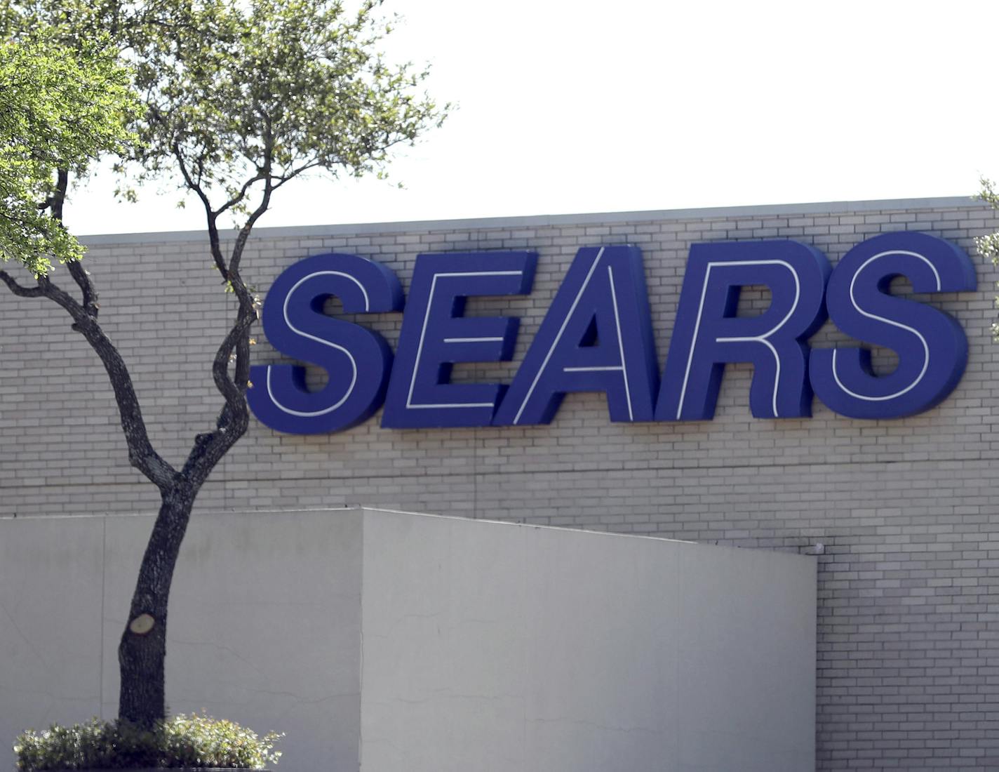 A Sears store is shown Thursday, March 23, 2017, in Houston. Sears, a back-to-school shopping destination for generations of kids and the place newlyweds went to choose appliances, has said that after years of losing money that there is "substantial doubt" it will be able to keep its doors open.(AP Photo/David J. Phillip)