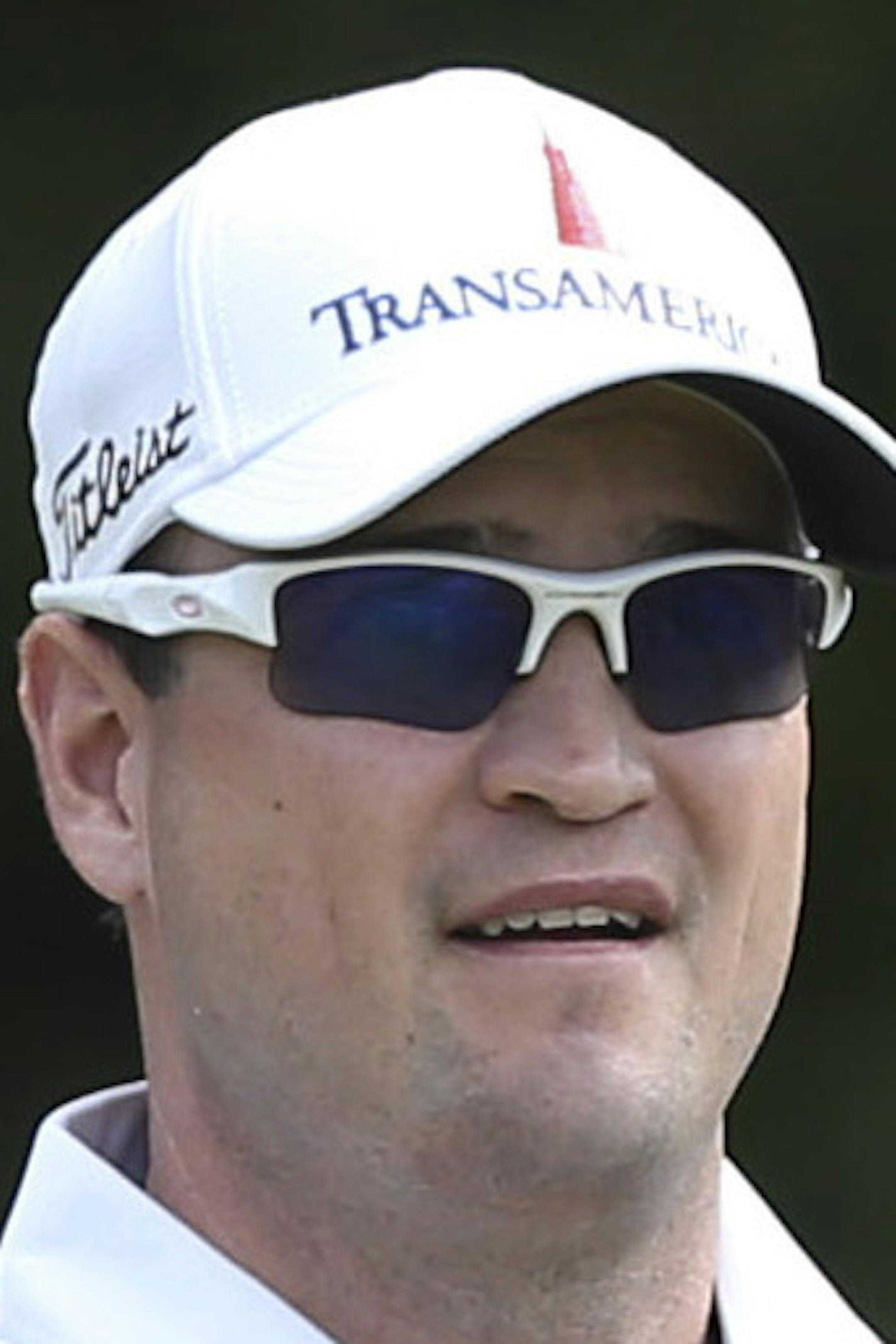 Zach Johnson of the United States watches his shot off the 9th tee during the first round of the British Open Golf Championship at Muirfield, Scotland, Thursday July 18, 2013. (AP Photo/Scott Heppell)
