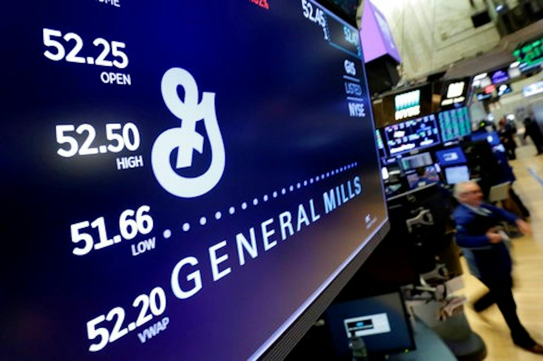 The logo for General Mills appears above a trading post on the floor of the New York Stock Exchange, Friday, Feb. 23, 2018. General Mills agreed to buy pet food maker Blue Buffalo for $8-billion in its first foray into pet food. (AP Photo/Richard Drew)