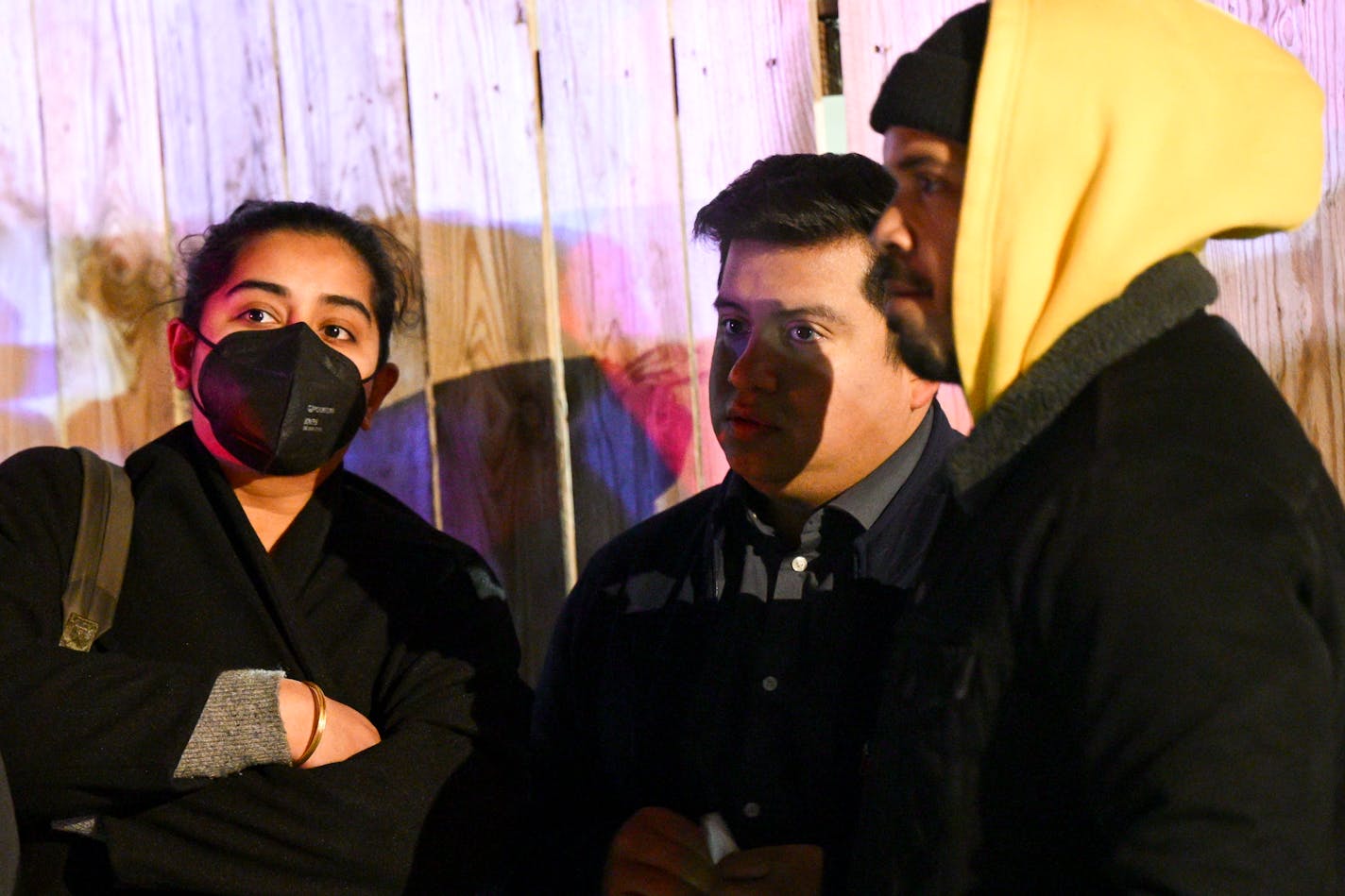 Minneapolis City Council members Aisha Chughtai, Jason Chavez and Jeremiah Ellison, left to right, speak Tuesday, Dec. 12, 2023 outside the Nenookaasi encampment in Minneapolis, Minn. as police investigate a homicide in the encampment.