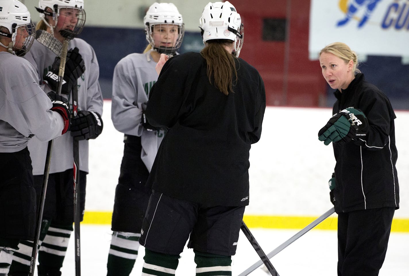 Christina Hanson, co-head coach of the Mounds View girls hockey team coaches during practice at Schwan Super Rink in Blaine on Wednesday, December 31, 2014. ] LEILA NAVIDI leila.navidi@startribune.com /