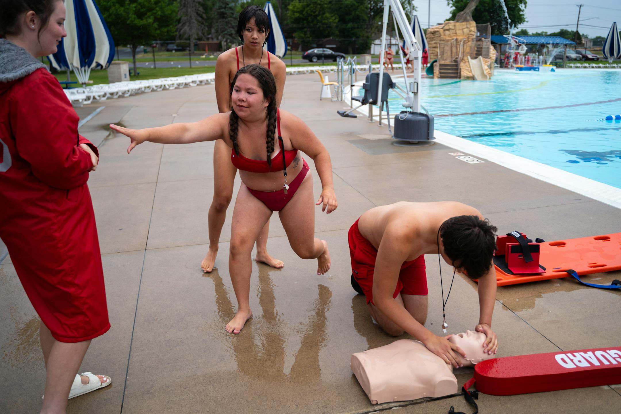 Students practice CPR during lifeguard lessons.