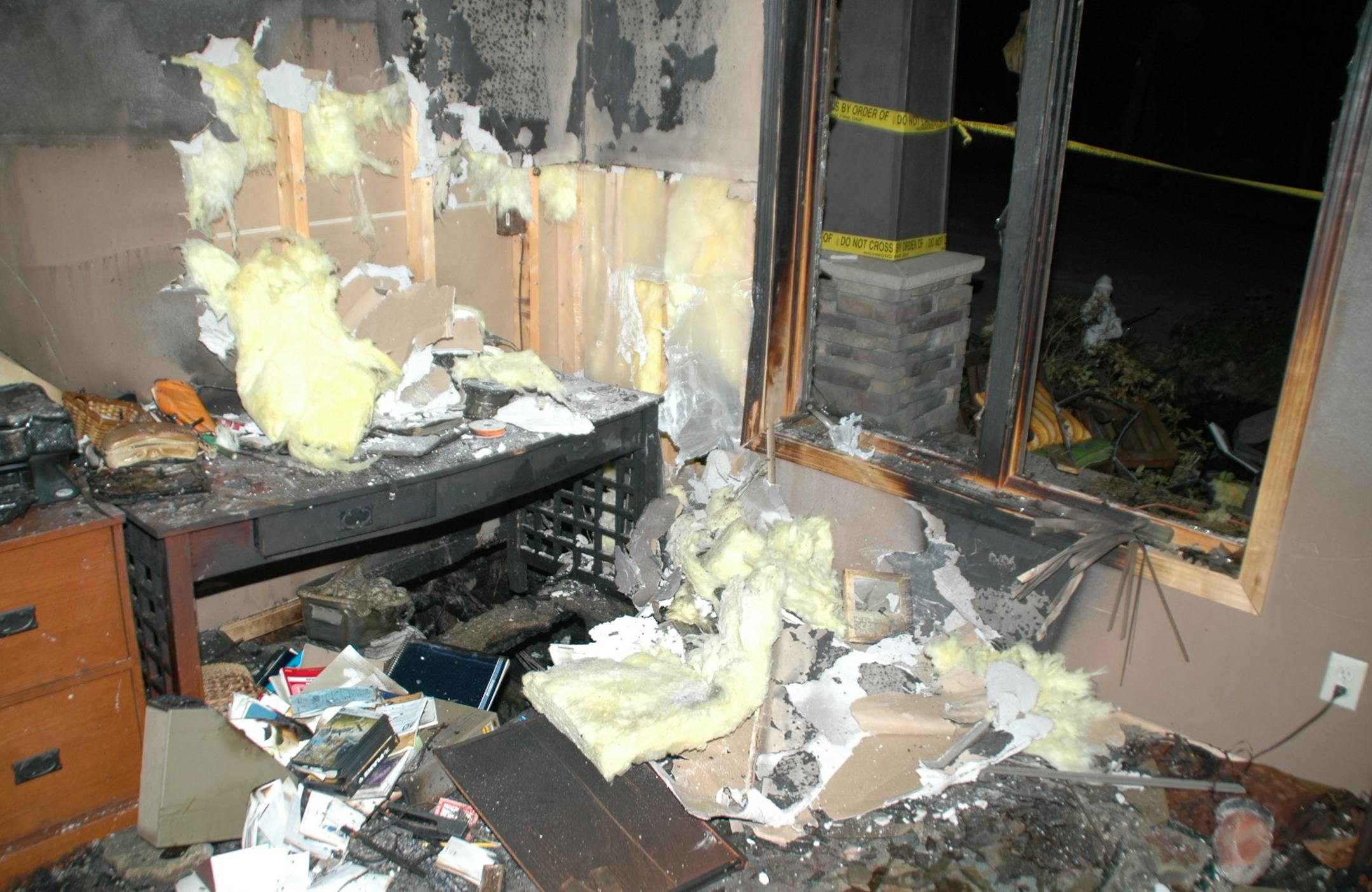 Photo after a 2010 fire in Cold Spring, Minn., that started in front of a garage, with investigators determining it ignited from a stain-soaked brush next to paint and stain cans after the homeowner stained garage doors. Photo courtesy of the Minnesota State Fire Marshal Division.
