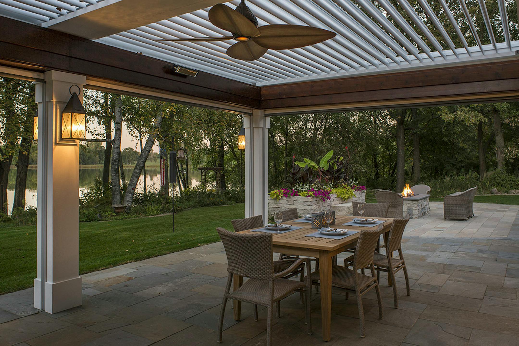 This porch expansion in Lake Elmo has a motorized pergola roof that can be opened and closed.