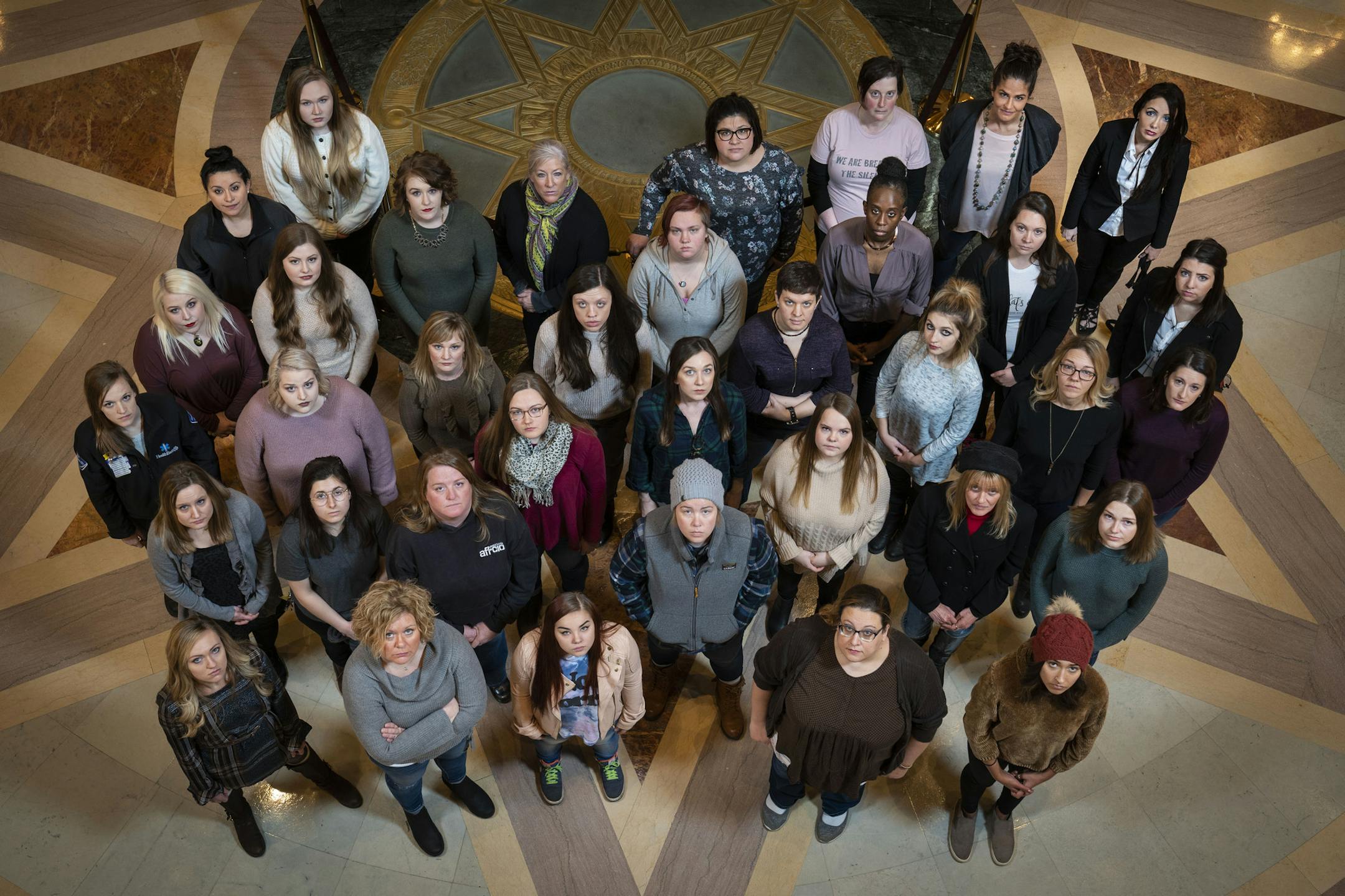 Group photo of participants in the Denied Justice series at the State Capitol in St. Paul, Minn., on December 22, 2018. ] RENEE JONES SCHNEIDER &#xa5; renee.jones@startribune.com