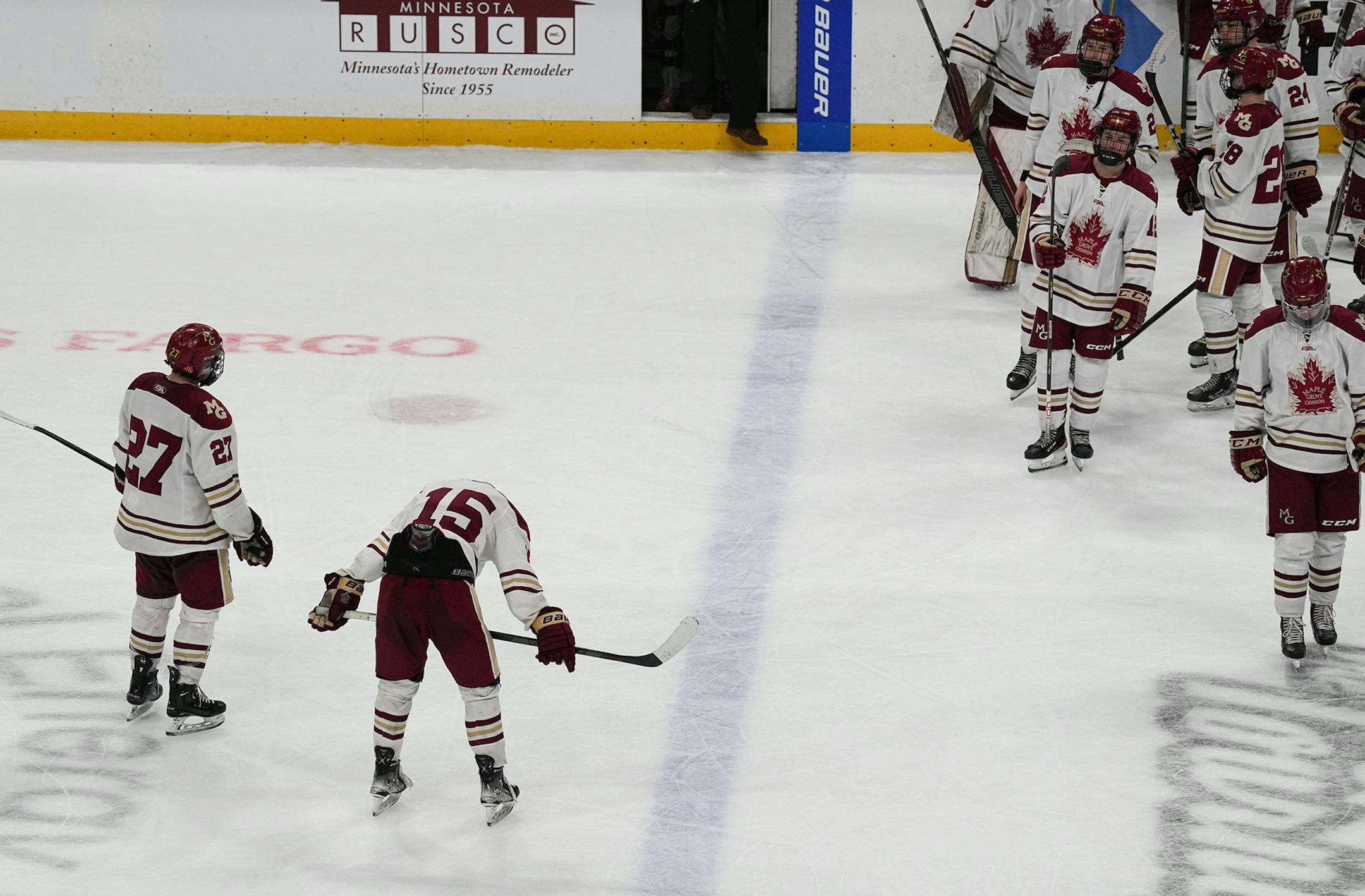 Maple Grove forward Jack Kernan (15) hangs his head after losing to Cretin-Derham Hall  in the third period.