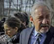 Attorney Mark Geragos, right, leaves Brooklyn Federal Court with Clare Bronfman, left, a member of Nxivm-- an organization charged in sex trafficking,