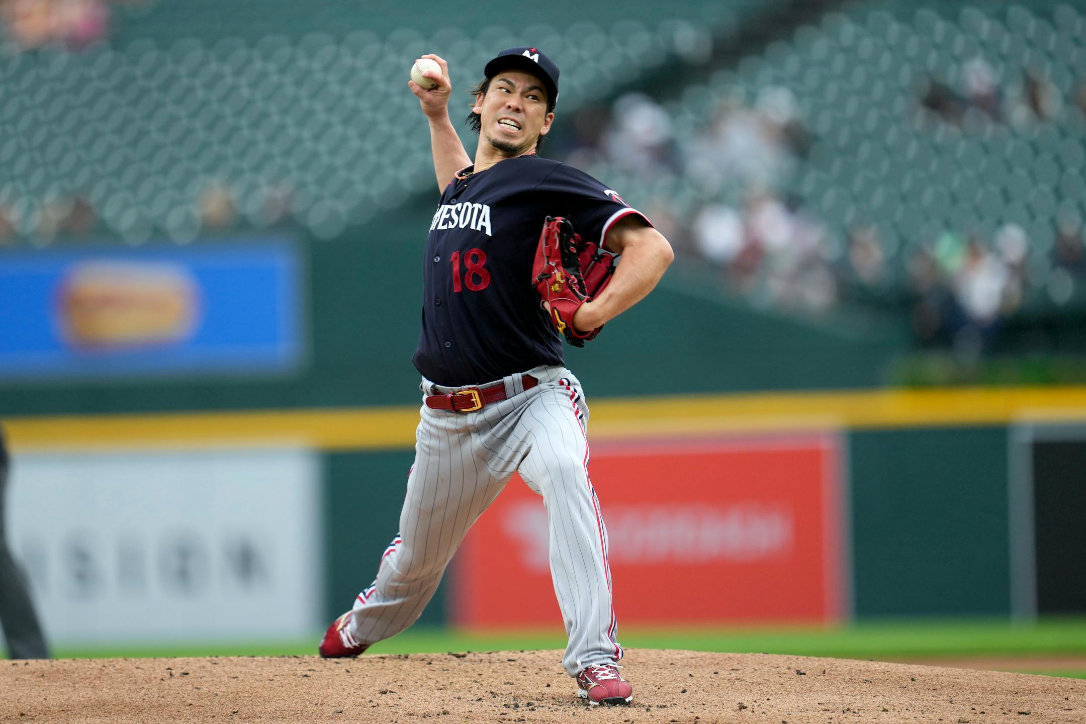 Twins pitcher Kenta Maeda throws against the Tigers in the first inning Friday