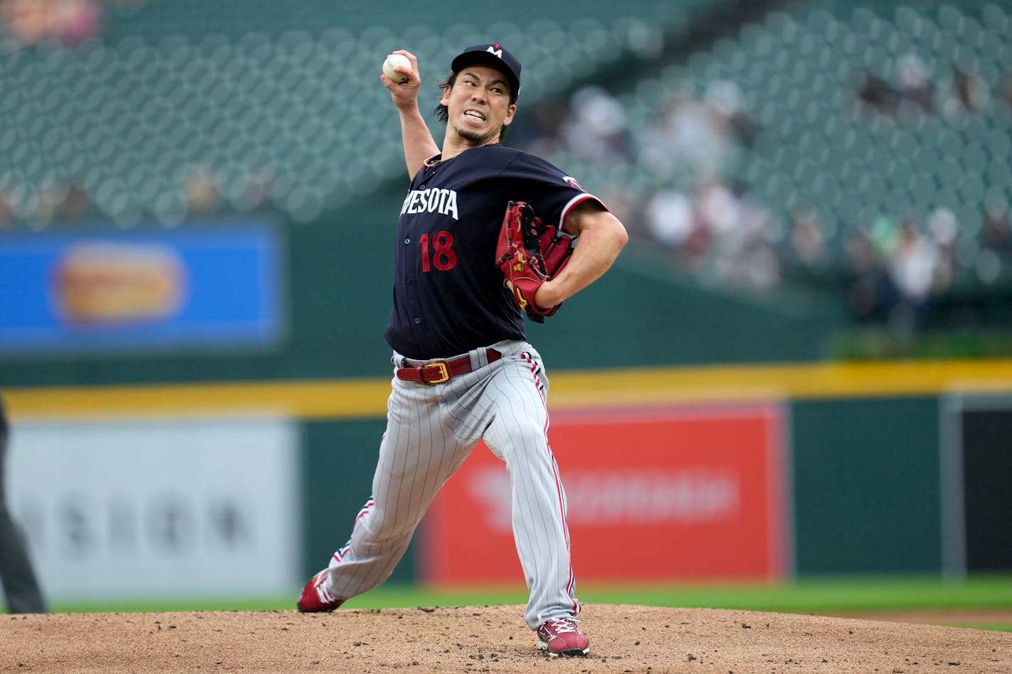 Twins pitcher Kenta Maeda throws against the Tigers in the first inning Friday