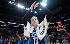 Minnesota Lynx guard Lindsay Whalen (13) celebrated her team's 80-69 victory over the Los Angeles Sparks, forcing a game five in the WNBA Finals. ] AA