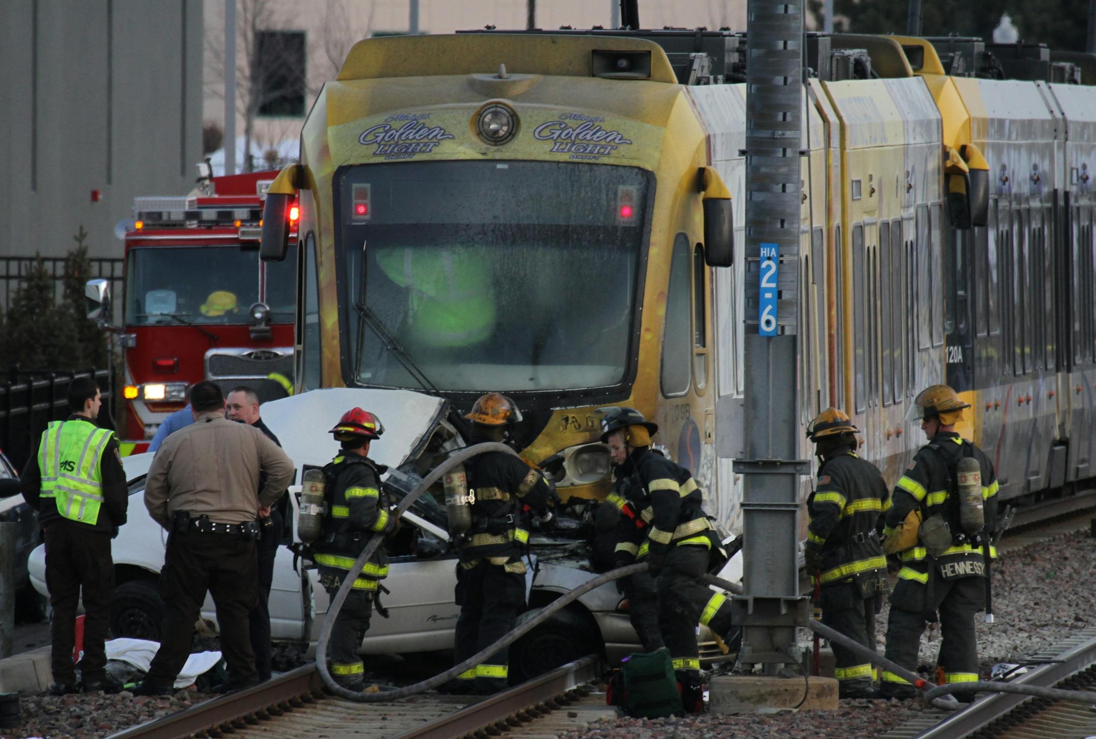 Minneapolis firefighters and paramedics responded to the crash between a small car and a light rail train near the intersection of 26th and Hiawatha.