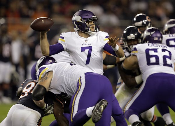Minnesota Vikings quarterback Case Keenum (7) throws a pass during the first half of an NFL football game against the Chicago Bears, Monday, Oct. 9, 2
