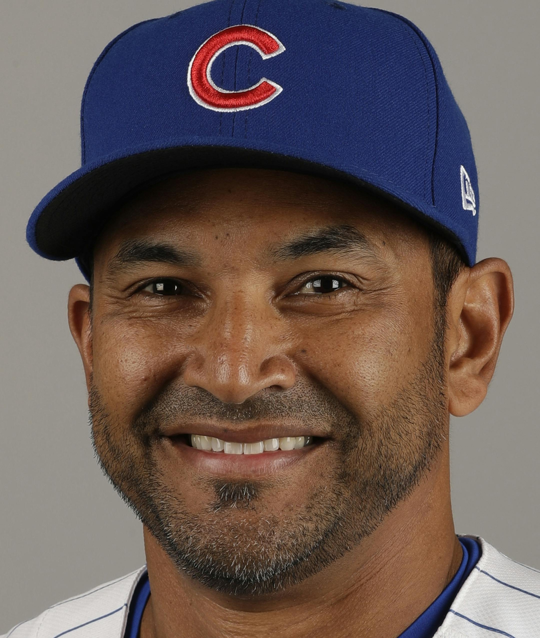 FILE - This Tuesday, Feb. 21, 2017, file photo shows Chicago Cubs bench coach Dave Martinez. A person with knowledge of the deal tells The Associated Press, Sunday, Oct. 29, 2017, that the Washington Nationals and Martinez have agreed to a managerial contract for three years plus an option. (AP Photo/Morry Gash, File)