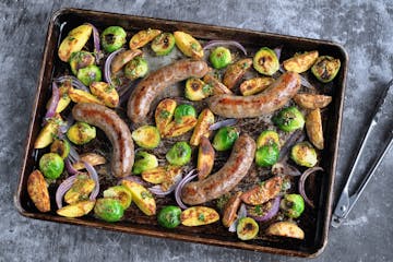 Roasted Sausage Dinner with Potatoes and Brussels Sprouts in Mustard Vinaigrette.