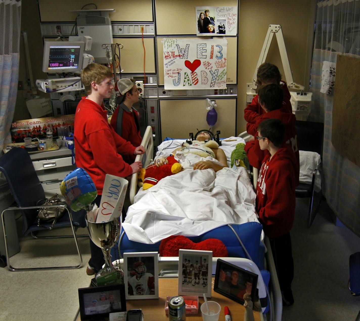 Teammates and friends kept Jack Jablonski company in the Intensive Care unit of HCMC on Monday.