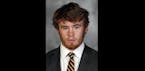 U football player kicked off team after being charged with assaulting police officer