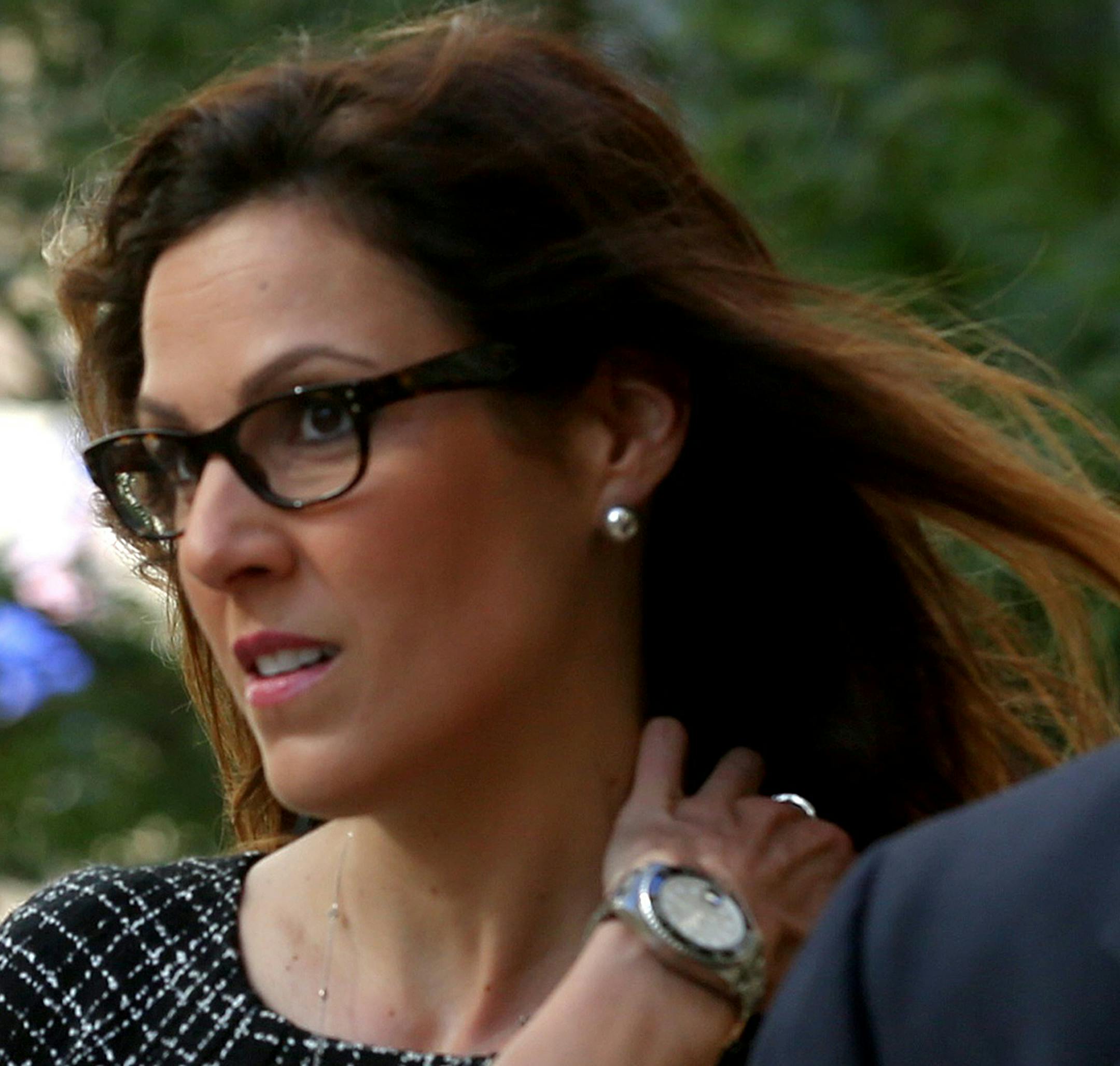 FILE - In this July 22, 2014, file photo, Taya Kyle, left, widow of Navy Seal and author Chris Kyle, arrives at court in St. Paul, Minn. Jurors in former Minnesota Gov. Jesse Ventura's defamation lawsuit against "American Sniper" author Chris Kyle have gone home for the night Monday, July 28, 2014, but will return Tuesday. (AP Photo/The Star Tribune, Jim Gehrz, File) MANDATORY CREDIT; ST. PAUL PIONEER PRESS OUT; MAGAZINES OUT; TWIN CITIES LOCAL TELEVISION OUT ORG XMIT: MIN2014072920511165