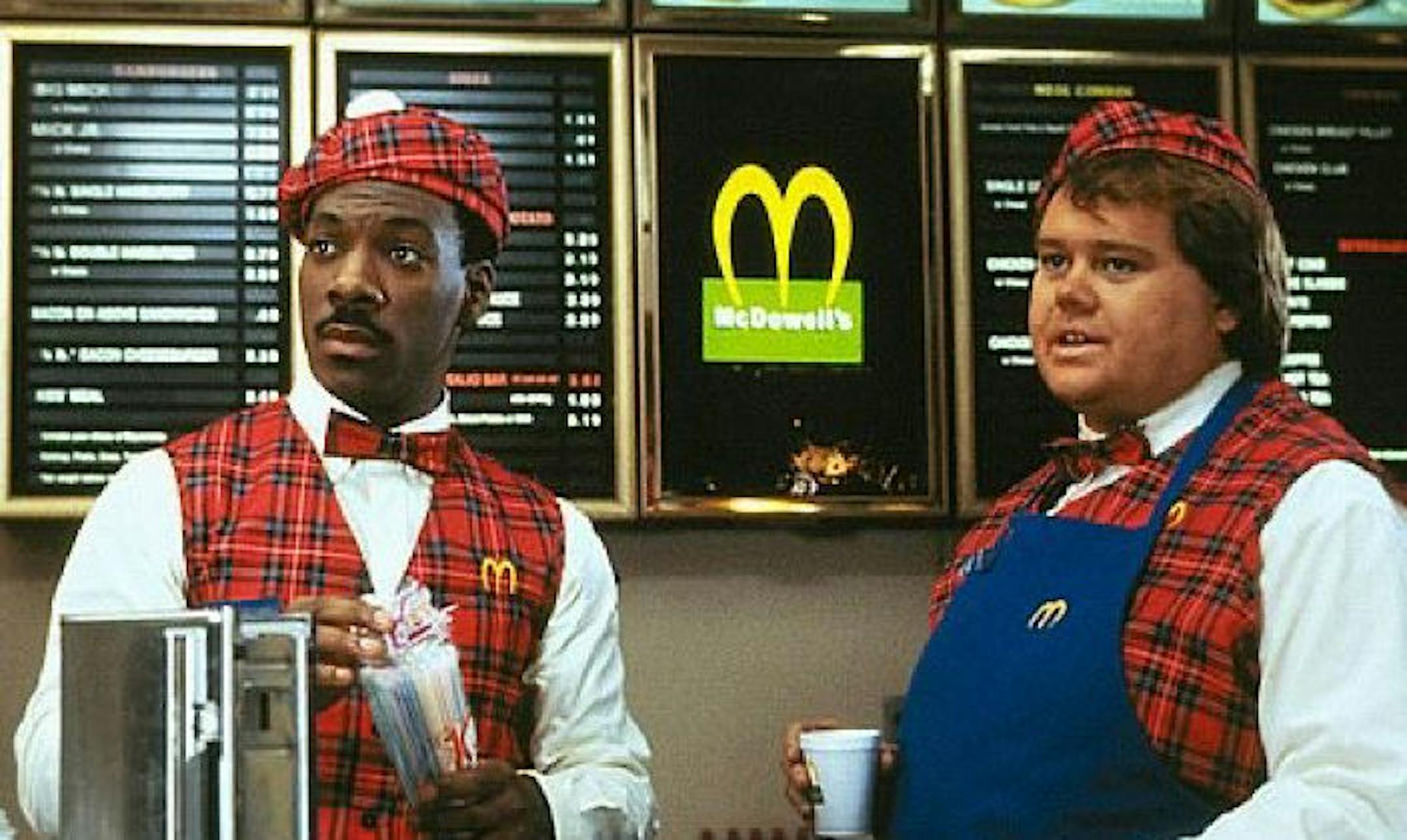 Louie Anderson with Eddie Murphy in the 1988 movie "Coming to America."