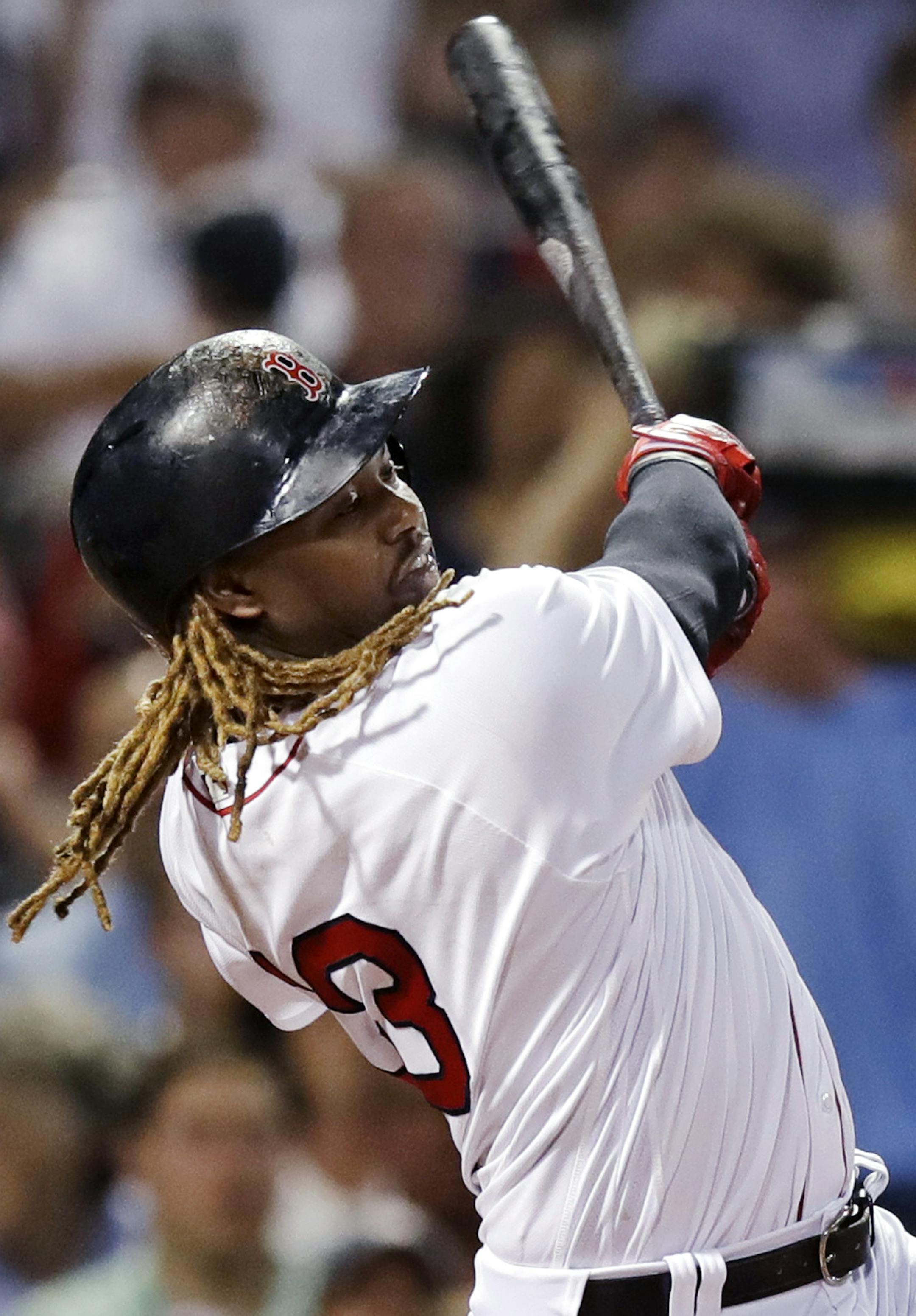 Boston Red Sox designated hitter Hanley follows through on his solo home run against the Minnesota Twins during the sixth inning of a baseball game at Fenway Park in Boston, Thursday, June 29, 2017. (AP Photo/Charles Krupa)