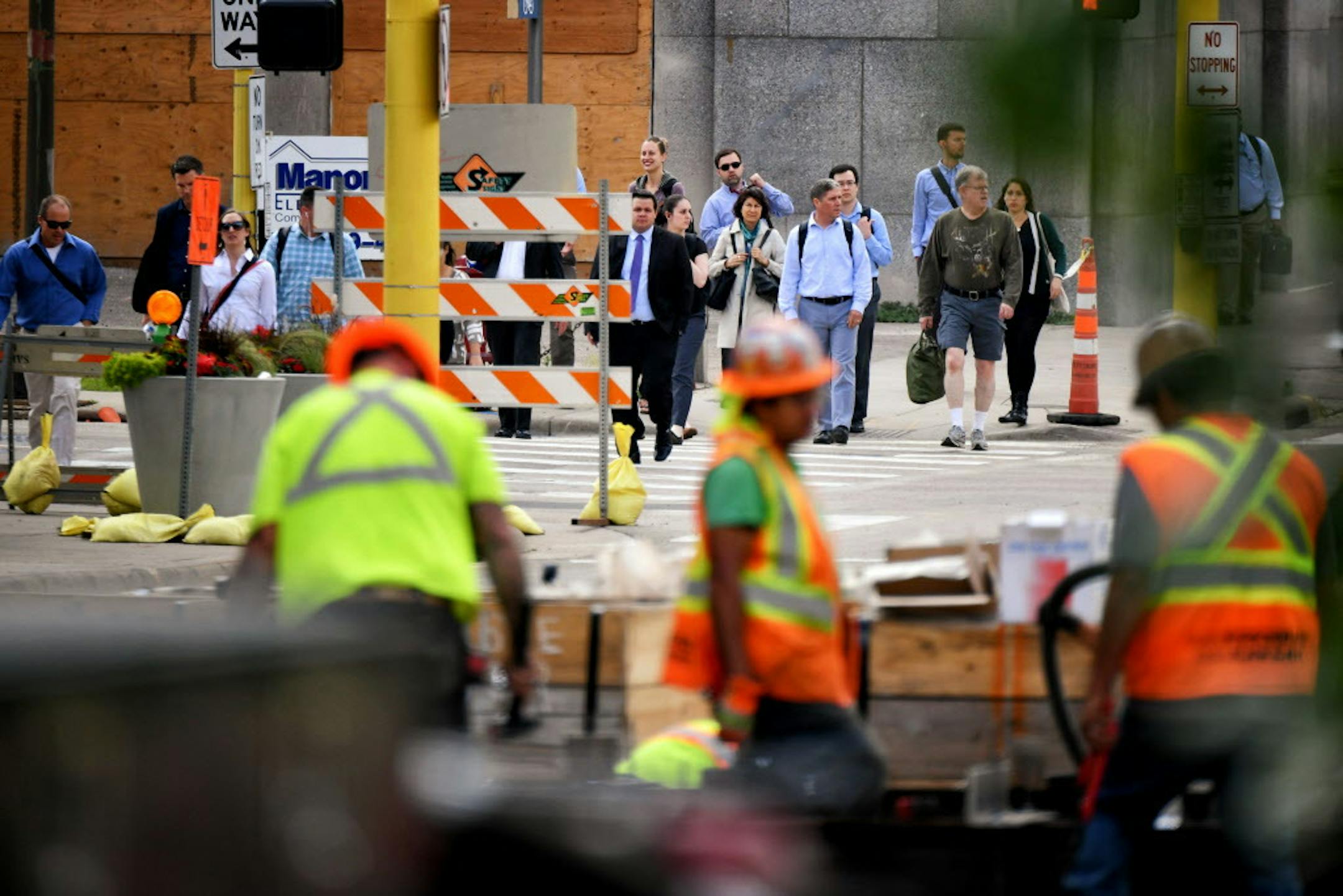 Afternoon commuters walked down 5th Street to the USBank Stadium light rail line which in closed for reconstruction in downtown Minneapolis until July 3.
