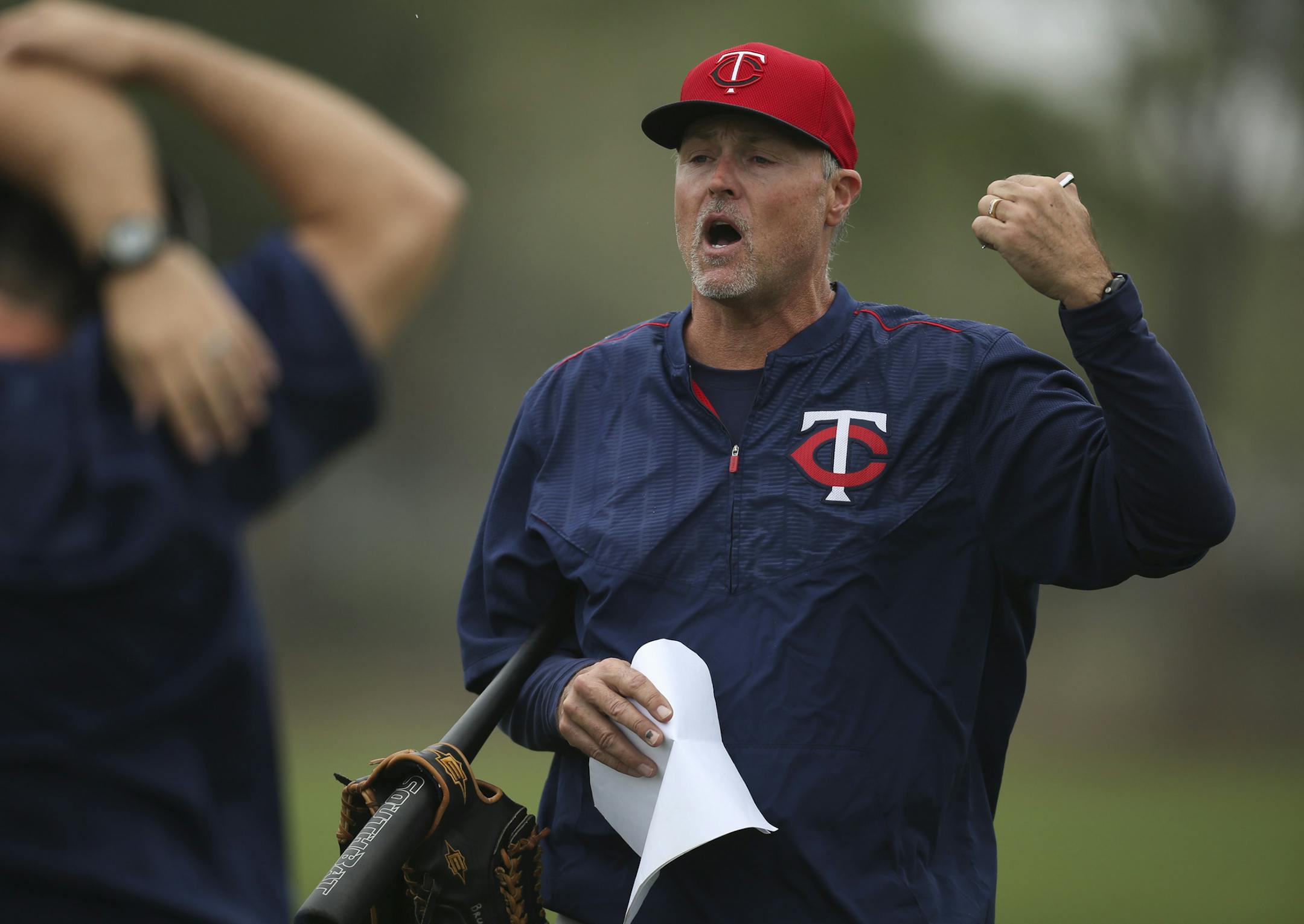 As raindrops started falling Thursday morning, hitting coach Tom Brunansky briefed the position players while they stretched before in informal practice at Hammond Stadium. ] JEFF WHEELER • jeff.wheeler@startribune.com Twins pitchers and catchers continued their workouts Thursday morning, February 26, 2015 at Hammond Stadium in Fort Myers, FL.