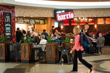 Cocina del Barrio in MSP Terminal 2 was busy with travelers enjoying food and alcoholic drinks before 7 a.m. January 31, 2020. LEILA NAVIDI • leila.