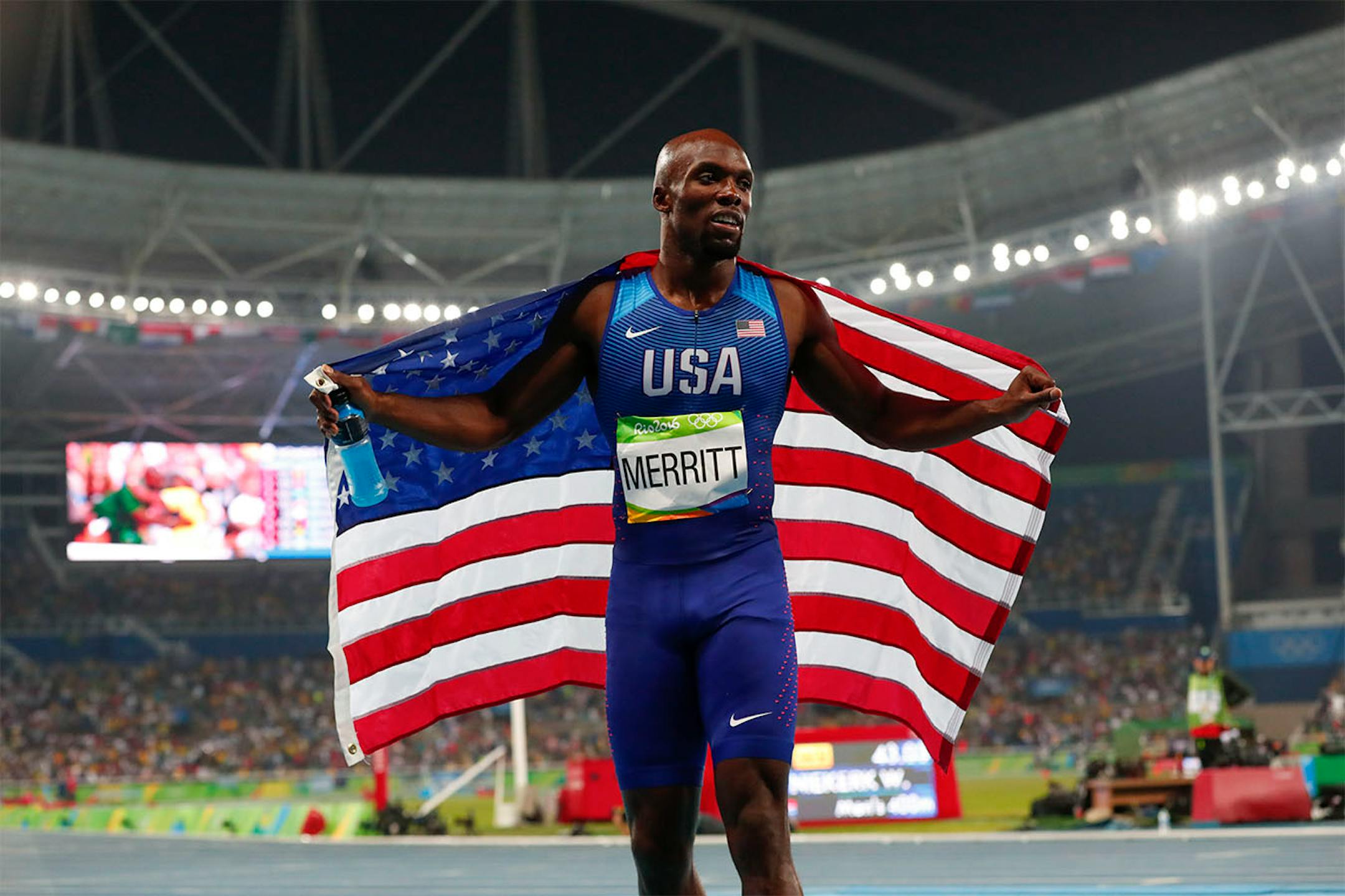LaShawn Merritt of the U.S. with an American flag after the men's 400-meter race during the 2016 Summer Olympics in Rio de Janeiro, Aug. 14, 2016. Merritt earned a bronze medal in the event. (Doug Mills/The New York Times)