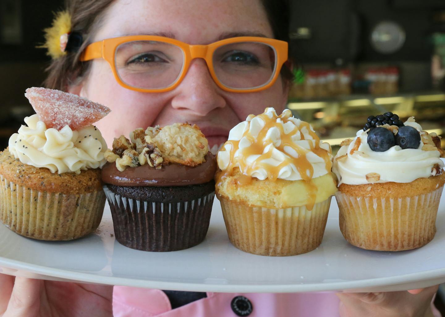 Groudswell baker, Megan Greulich with the cupcake flight. ] STAR TRIBUNE/TOM WALLACE Assignments #20029971A July 19, 2013 SLUG & MAGIC SAXO#: 490032 rn072513 EXTRA INFO: At Groundswell, Beautiful latte's, waffle sandwich, veggie flatbread and a cupcake flight, the exterior , and chef Johnny Becker.