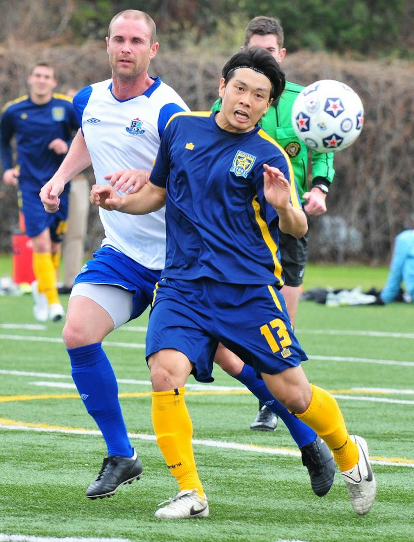 Kentaro Takada (13), in an exhibition Monday against FC Edmonton, and the rest of the Stars feel the pressure to build attendance.