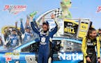 Dale Earnhardt Jr. celebrates in Victory Lane after winning the Talladega 500 NASCAR Sprint Cup Series auto race at Talladega Superspeedway, Sunday, M