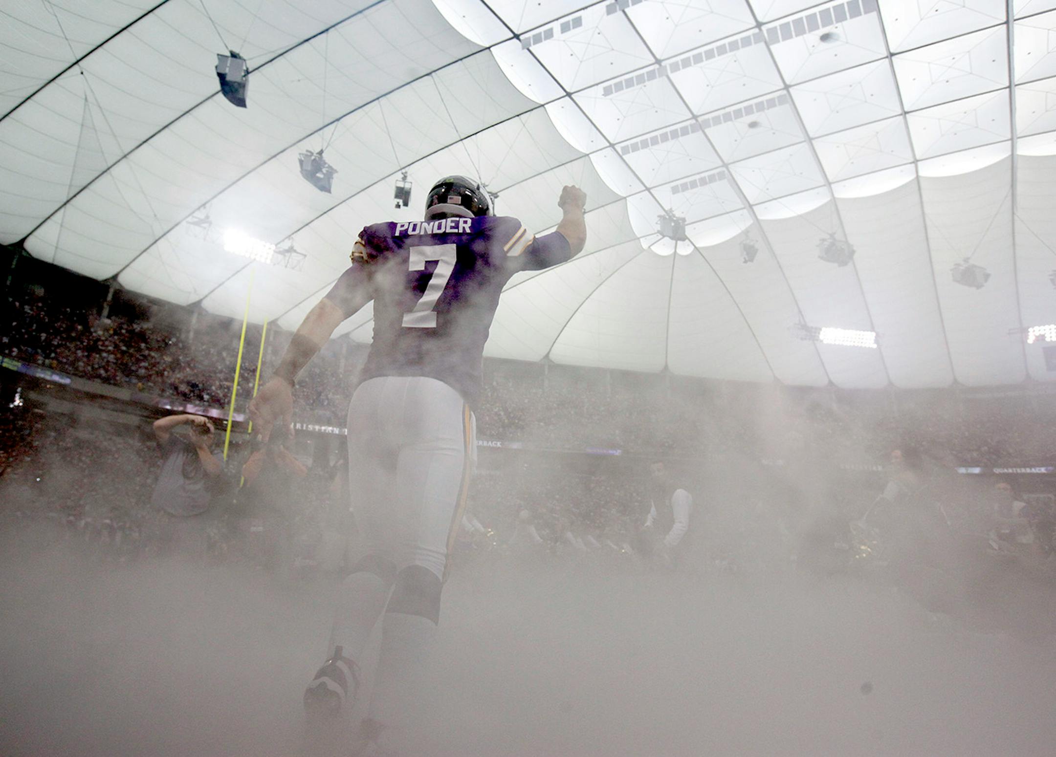 Vikings quarterback Christian Ponder (7) ran on the field during introductions before the start of the game. It was Ponder's first professional start. Green Bay beat Minnesota by a final score of 33-27. ] CARLOS GONZALEZ cgonzalez@startribune.com, October 23, 2011, Minneapolis, Minn, Mall of America Field, The Metrodome, NFL, Minnesota Vikings vs. Green Bay Packers