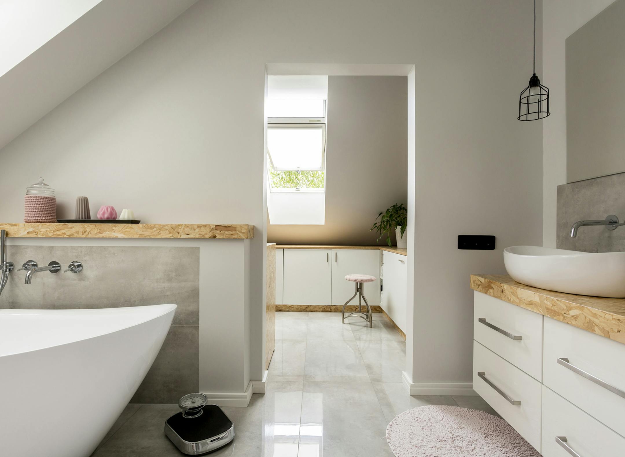 Heated flooring, soaking tubs and smart technology are popular modern bathroom features. (Dreamstime)