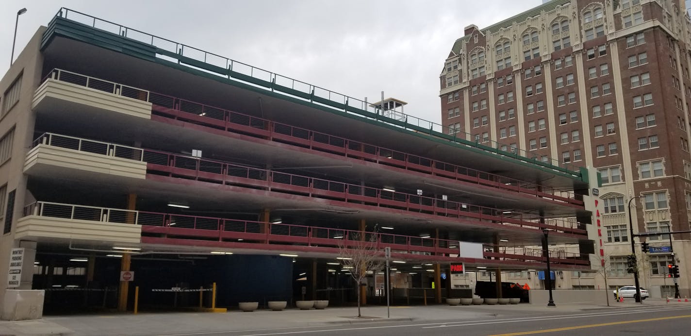 Downtown Auto Park has very recently been spiffed up, mainly by painting over the stainless steel panels.