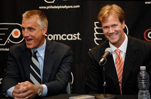 Paul Holmgren, left, was GM of the Philadelphia Flyers when the team added Chris Pronger, right, in 2009.