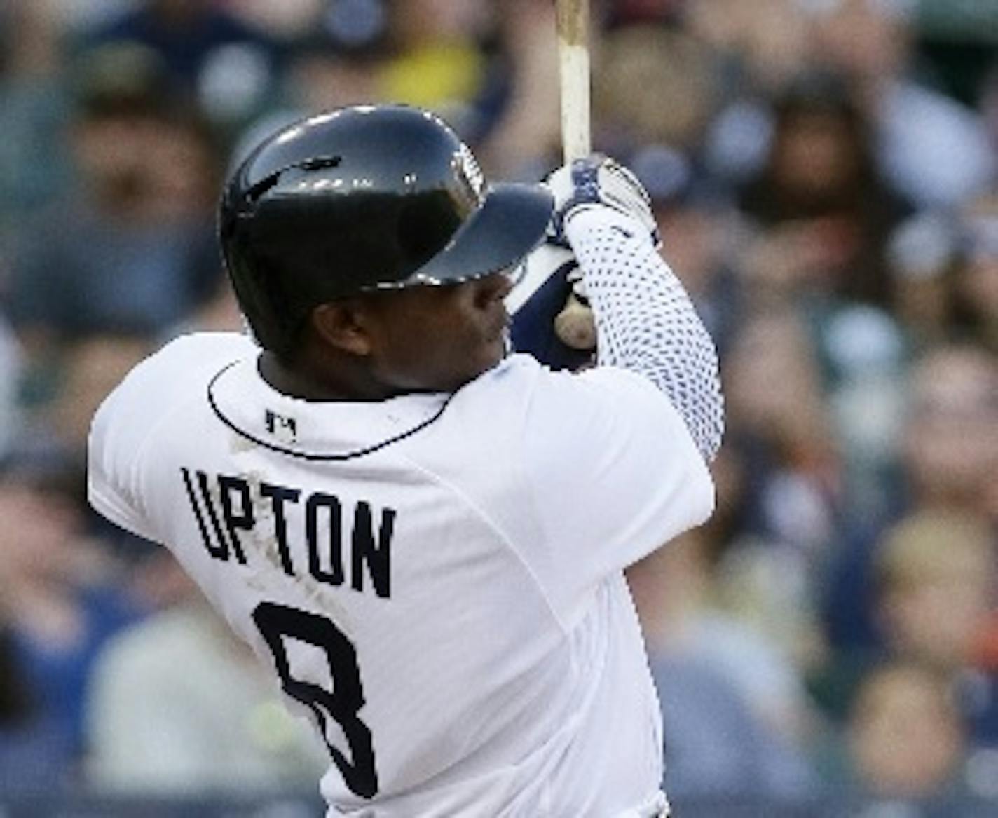 The Tigers' Justin Upton hit a solo home run the Twins' Ricky Nolasco during the second inning Monday.