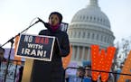 Rep. Ilhan Omar, D-Minn. speaks during the rally outside of the U.S. Capitol, during a house vote to measure limiting President Donald Trump's ability