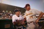 Twins manager Paul Molitor, and U of M coach John Anderson visited before pregame ceremonies Wednesday evening at Hammond Stadium. Monitor played for 