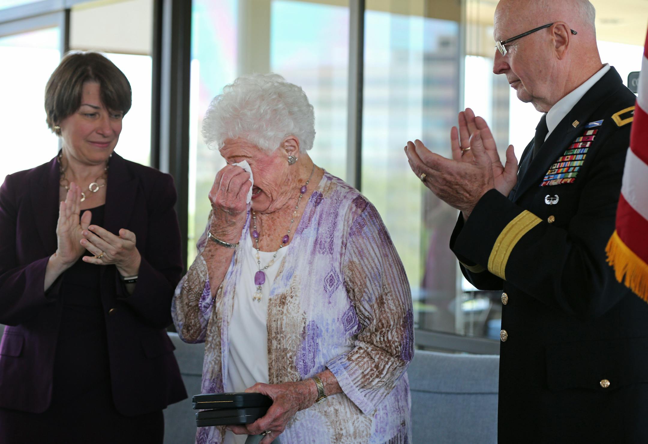 On Thursday, Sen. Amy Klobuchar and Minnesota National Guard Major General Richard Nash presented the Bronze Star and Purple Heart to Catherine Tauer, the widow of long-lost World War II soldier Gerald Jacobsen.