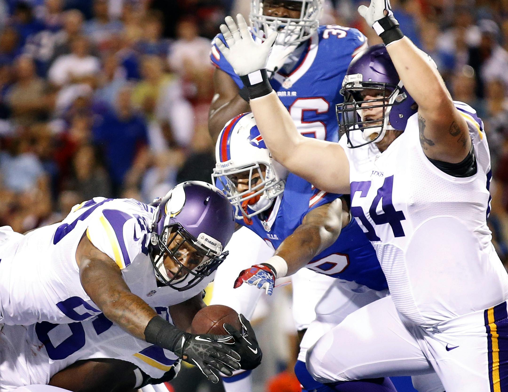 Minnesota Vikings running back Joe Banyard (23) crossed the goal line for a touchdown in the fourth quarter. ] CARLOS GONZALEZ cgonzalez@startribune.com August 16, 2013, NFL Ralph Wilson Stadium, Orchard Park, NY Minnesota Vikings vs. Buffalo Bills
