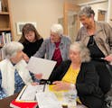 Members of the writers’ group at the Waters in Edina include (from left) Anne Franco, volunteer leader Kathleen Novak, Sally Stein, Mary Ann Hansen 