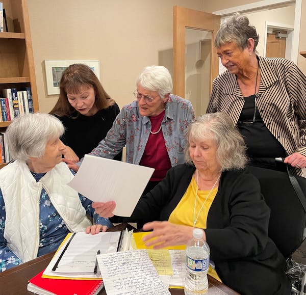 Members of the writers’ group at the Waters in Edina include (from left) Anne Franco, volunteer leader Kathleen Novak, Sally Stein, Mary Ann Hansen 