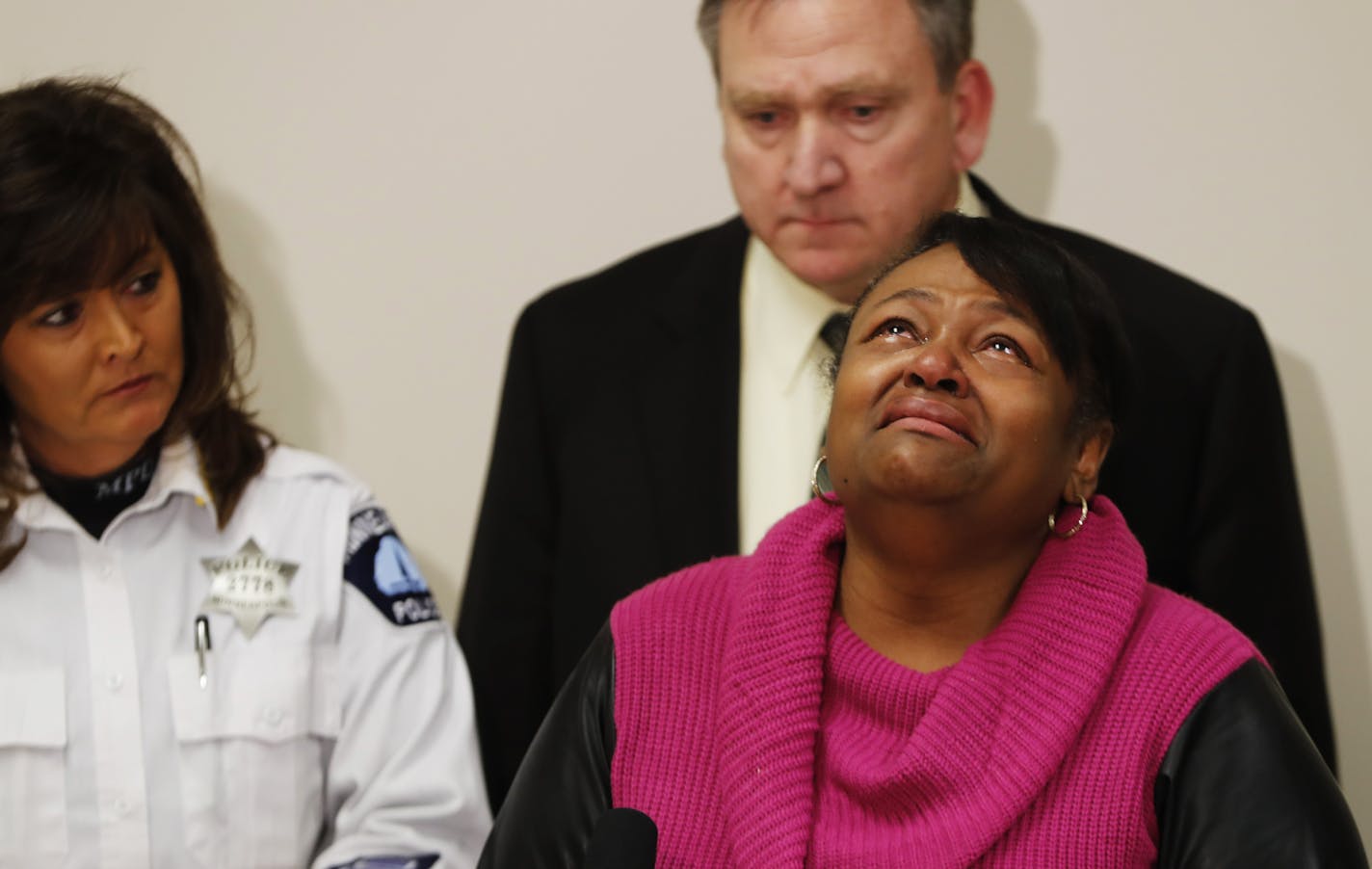 Sa'Lesha Beeks, flanked by Minneapolis Police Chief Jane&#xe9; Harteau and Sgt. Chris Thomsen, cried at a press conference announcing the arrest of a suspect in her mother's killing. ] Mark Vancleave - mark.vancleave@startribune.com * Minneapolis Police announced they have arrested a man they believe to have been behind the bullet that killed 59-year-old Birdell Beeks last May. Police said they Beeks was caught in the crossfire during a shootout between rival factions. Photographed Monday, Jan.