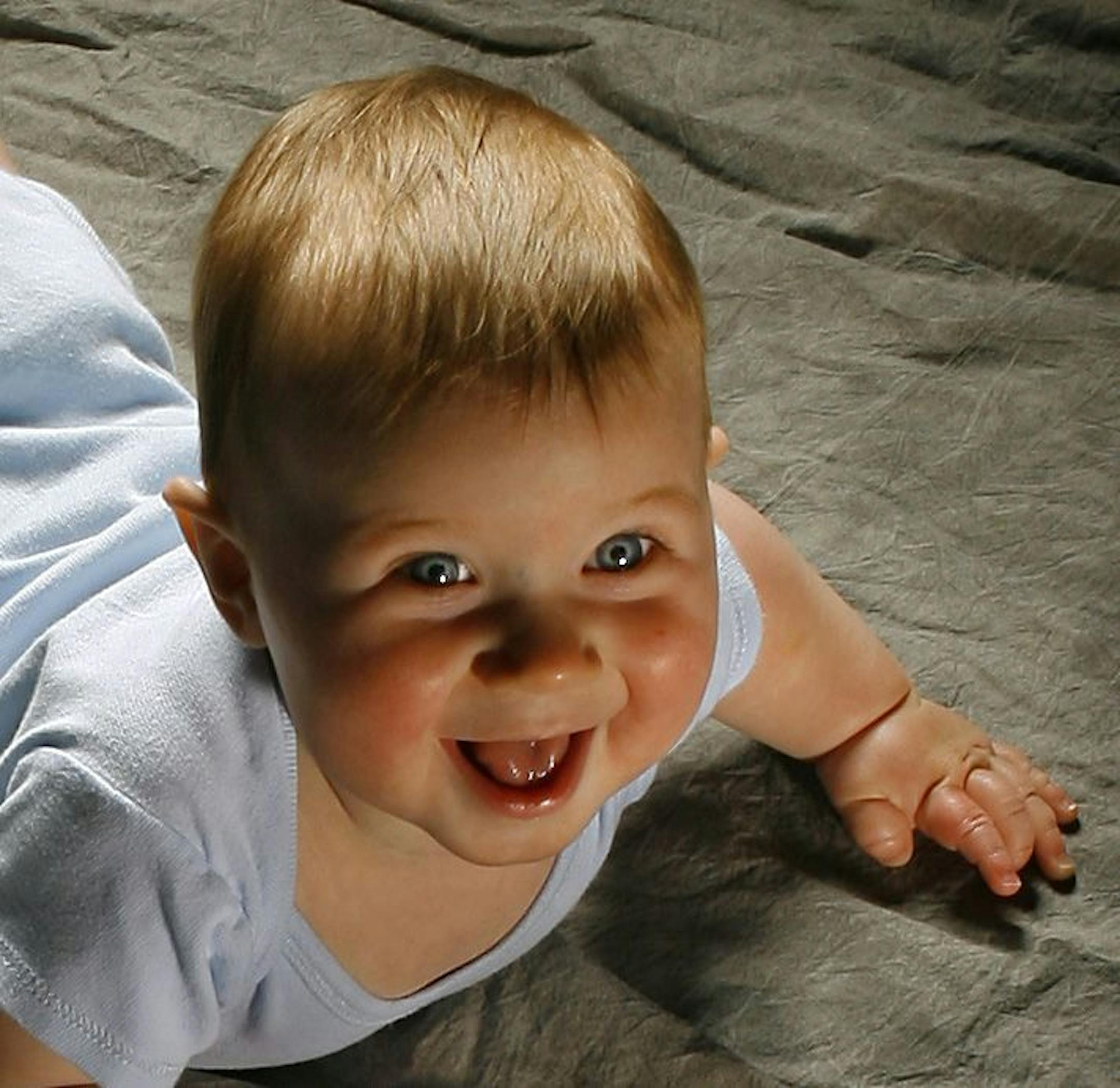 Baby photography has become more about the child�s personality and tiny body parts and less about cute outfits and props. To see a gallery of baby photographs, visit KansasCity.com. (Black-and-white photo by Shea Swinford of Shea Photography in Olathe, Kansas.)