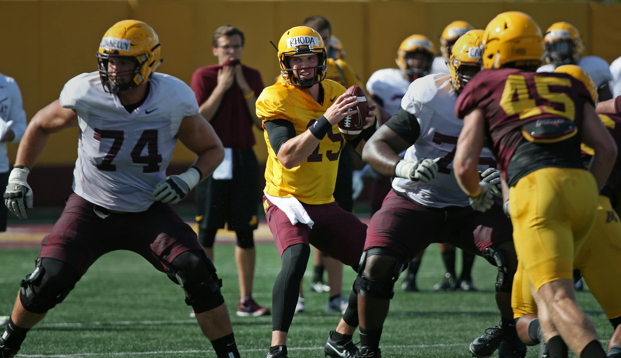 Gophers quarterback Conor Rhoda set up to pass during practice.