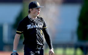 Duluth Marshall pitcher Owen Marsolek (21) reacts after throwing a complete game shutout against Proctor at Siebert Field in Minneapolis, Monday, May