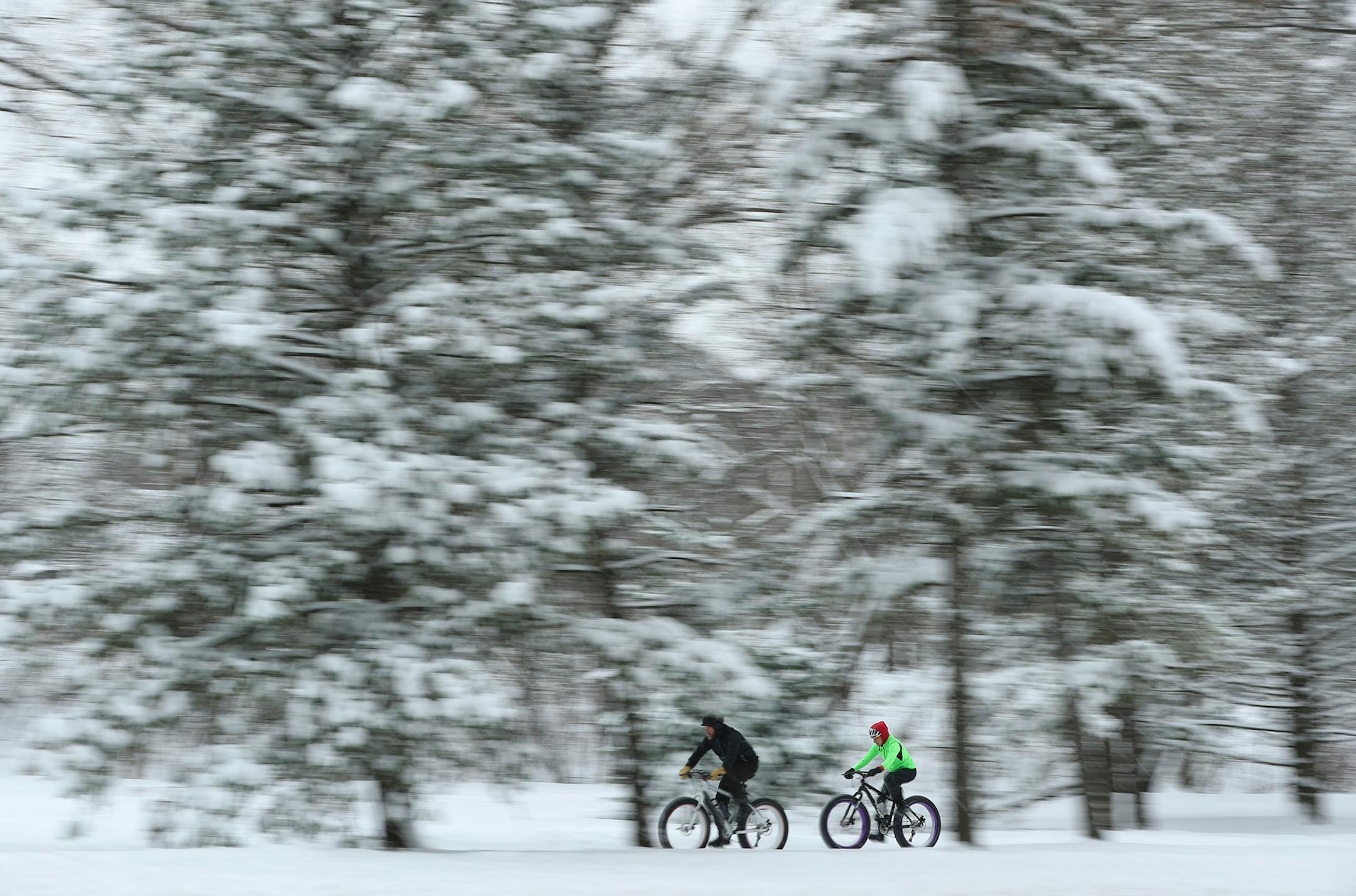 A pair of fat-tire cyclists rode along E. Minnehaha Pkwy.