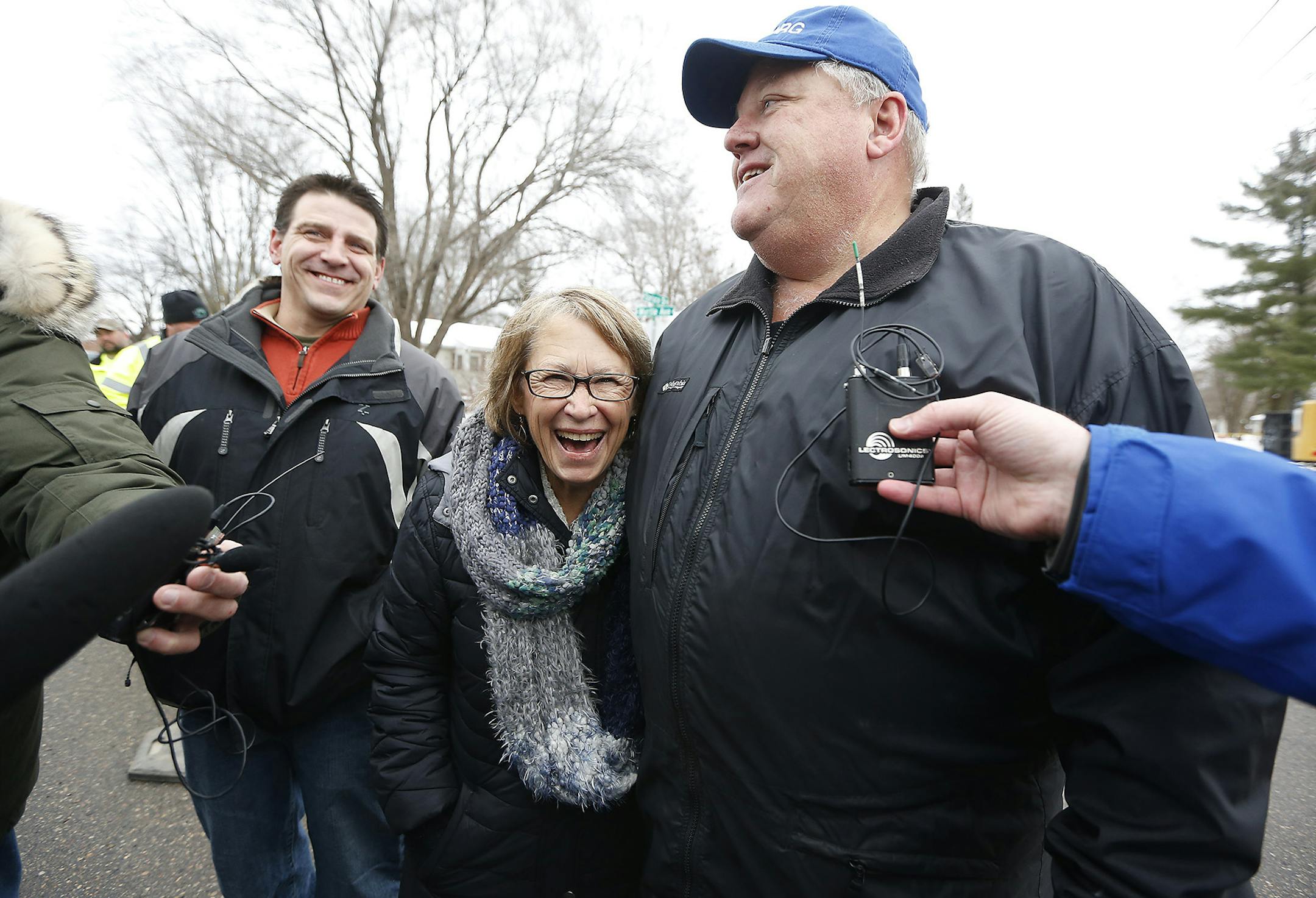 Patty Wetterling shared a laugh with Tim Thone, right, the man who bought the Annandale home that once belonged to Jacob Wetterling's killer and had it torn down Friday morning.