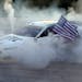 Brad Keselowski (2) celebrates his win with a burnout after winning the NASCAR Sprint Cup series auto race at Chicagoland Speedway in Joliet, Ill., Su